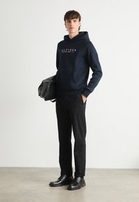Tommy Hilfiger NEW YORK HOODY - Sweatshirt - desert sky