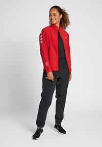 Hummel TRACK JACKET WOMAN - Trainingsvest - aura orange
