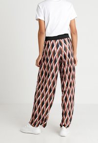 River Island Tygbyxor - orange