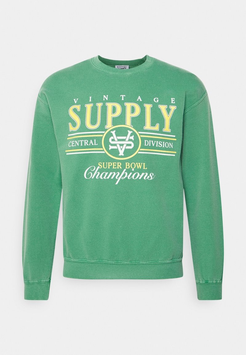 Zelená mikina z bavlny s kulatým výstřihem, na které je žlutý nápis "VINTAGE SUPPLY CENTRAL DIVISION" a "SUPER BOWL Champions."