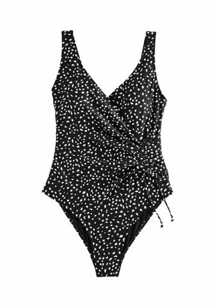 Costume da bagno intero nero con pois bianchi. Presenta un collo a V, dettagli arricciati sui fianchi e cordini regolabili sui fianchi.
