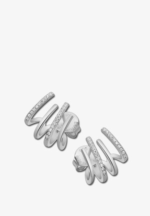 Boucles d'oreilles en argent au design ondulé, présentant trois lignes courbées ornées de petits pierres claires pour plus de détail.