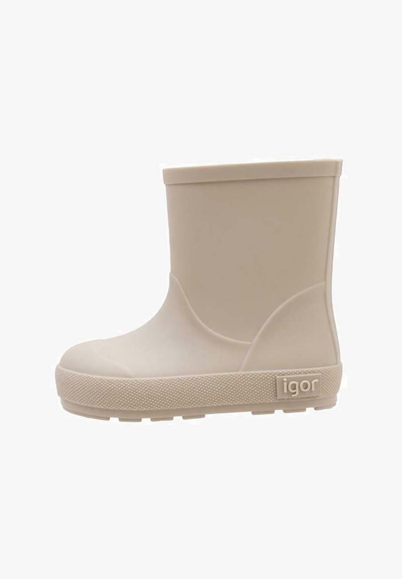 Bota de lluvia de goma beige con un exterior liso, puntera redondeada y suela texturizada. Presenta un pequeño logo en el costado y un diseño minimalista.