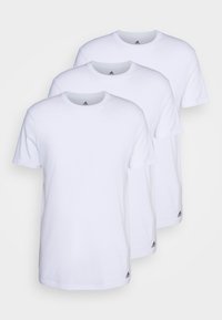 Three identical white t-shirts made of cotton, featuring a classic crew neck design and small black logo accents near the hem.