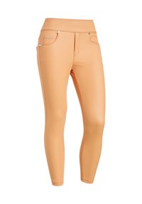 Leggings color pesca con alta vita, realizzati in un materiale liscio ed elastico. Presentano tasche decorative e sottili dettagli metallici.