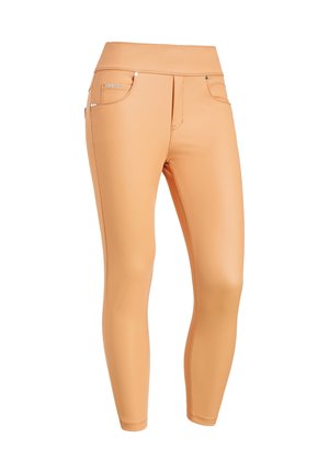 Leggings de couleur pêche à taille haute, fabriqués à partir d'un matériau lisse et extensible. Comprend des poches décoratives et des accents en matériel subtil.