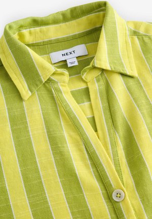 Green and yellow striped shirt with a collar, button placket, and white accents; made of textured fabric. Brand label: NEXT.