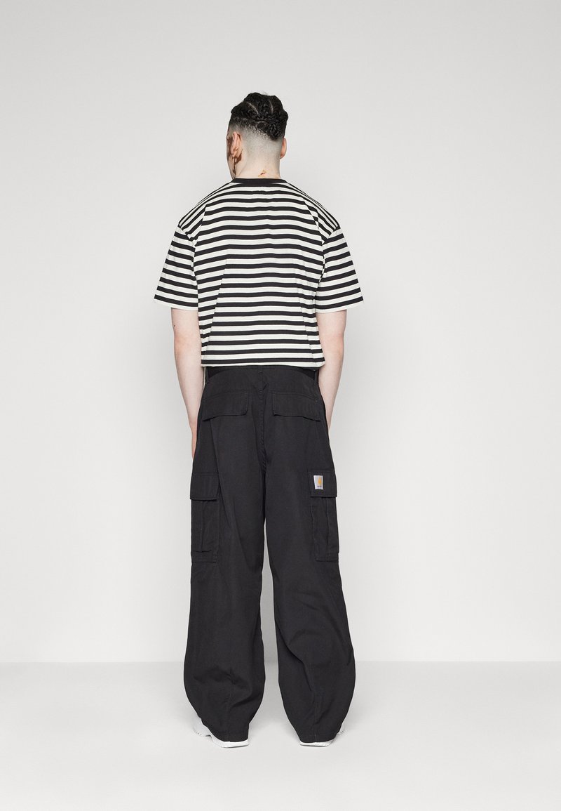 Carhartt WIP COLE PANT - Cargo trousers - black rinsed/black - Zalando