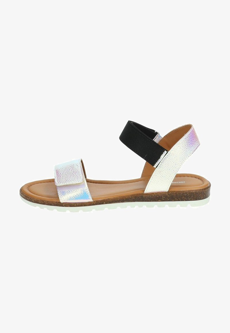 Sandal with a brown and white base, featuring a shimmery iridescent strap and black elastic band for support. Lightweight rubber sole.