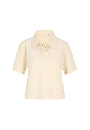 Polo shirt color crema realizzato in tessuto a coste, con colletto alla francese e maniche corte. Logo in oro sul lato sinistro in basso.
