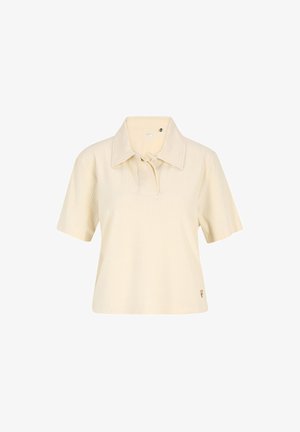 Polo shirt color crema realizzato in tessuto a coste, con colletto alla francese e maniche corte. Logo in oro sul lato sinistro in basso.