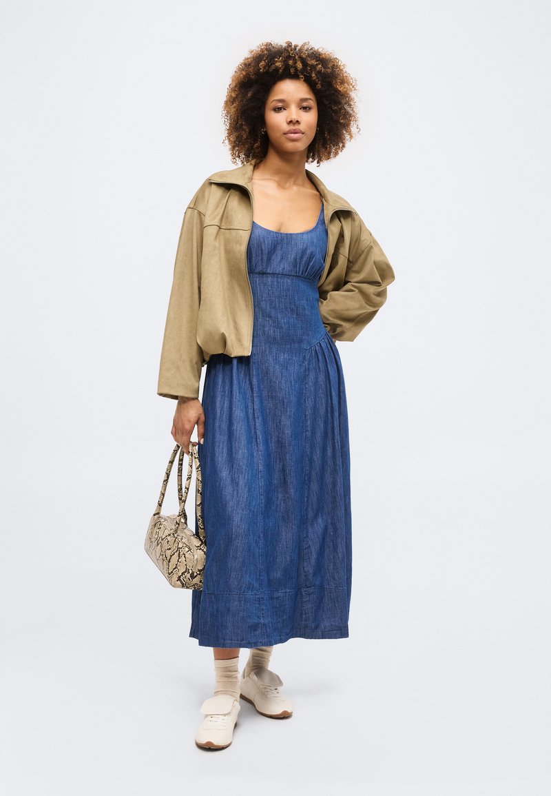 white christmas dresses Anthropologie Pilcro Denim Light Shirred-Waist Buttondown Mini Dress –  White Chocolate Couture main image 0
