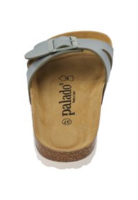 Grå lädersandaler med en justerbar rem, korkfotbädd och en lätt vit gummisula; insidan har en beige mocka-textur.