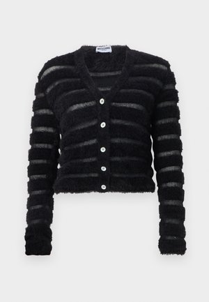 Schwarze, flauschige Strickjacke mit horizontalen, durchsichtigen Streifen, langen Ärmeln, V-Ausschnitt und fünf weißen Knöpfen vorne, mit dem Label Moschino.