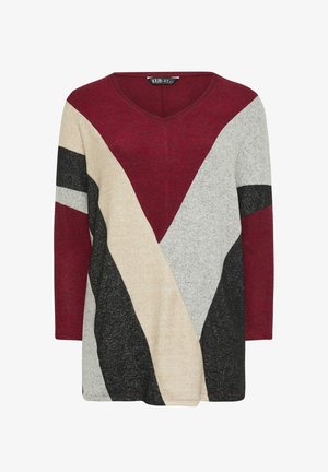 V-kaula-aukollinen, pitkähihainen neulepaita burgundinpunaisena, kermanvärisenä, harmaana ja mustana. Siinä on geometrinen väriblokkimalli ja pehmeä tekstuuri.