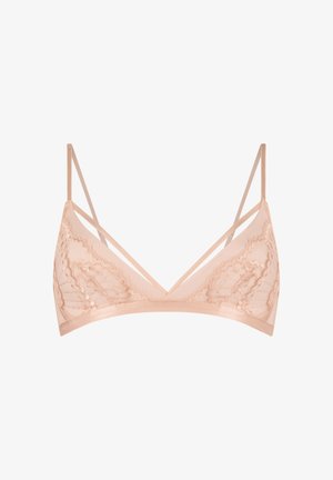 Licht perzik kleurige kanten bralette met delicate bloempatronen, verstelbare dunne bandjes en een gladde onderband, die een zachte, doorschijnende textuur biedt.