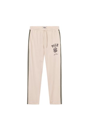 Cream-colored sweatpants with green side stripes, elastic waistband, and "YALE" graphic print along with a bulldog emblem.