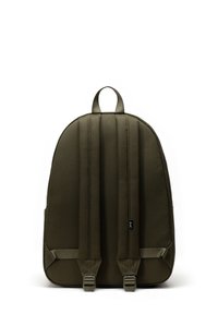 Olive green backpack with a rounded shape, padded back, and adjustable straps. Features a top handle and side pocket with buckles.