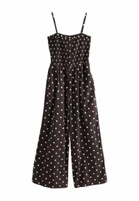 Salopetă maro cu buline albe, având bretele ajustabile, un corset elastic și un design cu picioare largi, dotată cu buzunare laterale.