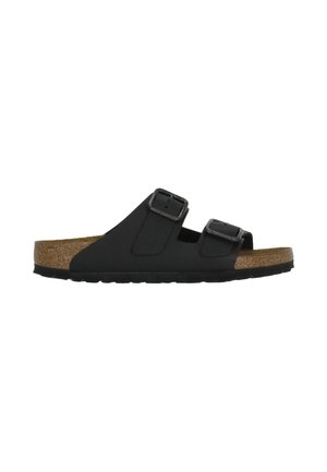 Sandalo slip-on nero con due cinturini regolabili con fibbia e sottopiede sagomato in sughero con suola nera.