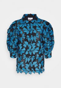 Black lace top featuring blue floral embroidery, puffed sleeves, a collar, and an open weave texture, highlighting intricate floral patterns.