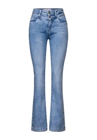 Ljusblå utsvängda jeans gjorda av denim, med knäppning, fem fickor och subtila blekningar. Benöppningarna vid fållen blir bredare.