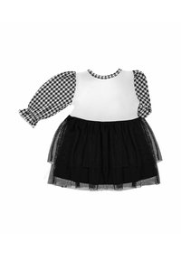 Czarna sukienka z tiulowym dołem, posiadająca biały gorset z rękawami w wzór pepitki. Warstwowa, przezroczysta spódnica z tiulu dodaje objętości i tekstury.