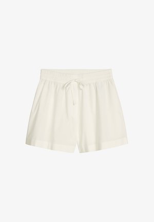 Shorts blancs décontractés avec taille élastique et cordon à l'avant, coupe ample et longueur mi-cuisse.