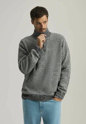 - Sweter