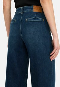 LIU JO HIGH-RISE - Jean flare - blue denim