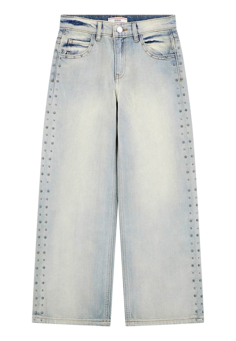 Jean en denim bleu clair à jambes larges et taille haute, présentant des clous décoratifs le long des coutures latérales et une finition délavée.