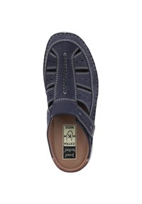 Navy blue slip-on shoe made of soft leather, featuring perforated details, white stitching, and a cushioned insole. Marked "Extra Wide."