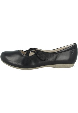 Chaussure plate en cuir noir avec bout arrondi, semelle beige, et lacet décoratif noir croisé sur le dessus.