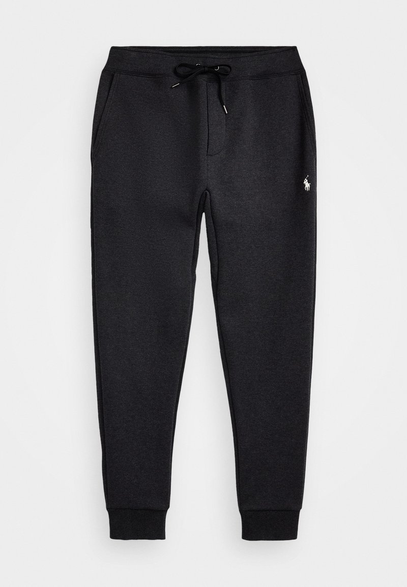Sorte sweatpants laget av mykt materiale, med elastisk midjebånd og snøring, sidelommer og en liten brodert logo.