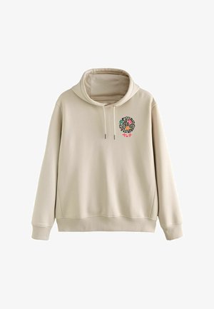 Beżowy sweatshirt z kapturem i kieszenią z przodu, z małym kolorowym abstrakcyjnym okrągłym wzorem oraz czerwonym napisem "tvt" na lewej piersi.
