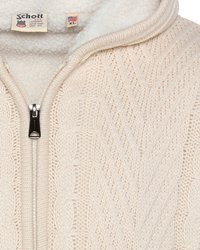 Maglione color crema con un motivo a maglia testurizzato, dotato di chiusura con zip e di un morbido colletto foderato in pile. L'etichetta mostra la marca e la taglia.
