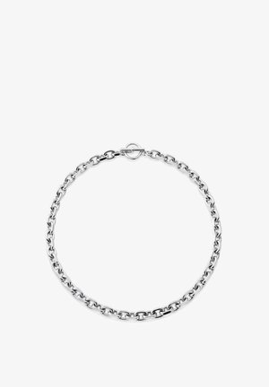 Hopeinen ketjukoru, jossa ovaalinmuotoiset lenkit ja pyöreä lukko, esillä valkoisella taustalla.