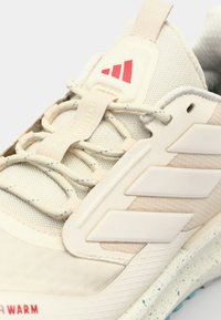 adidas Performance PUREBOOST 5 CLIMAWARM - Road running shoes - chalk white/off white