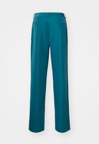 Teal wide-leg trousers with a smooth texture, featuring a mid-rise waist, two back pockets, and a clean, tailored design.