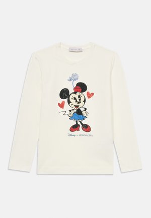 Camiseta de manga larga color crema con un gráfico de Minnie Mouse en lentejuelas en negro, rojo y azul, con detalles de corazones y cuello redondo.