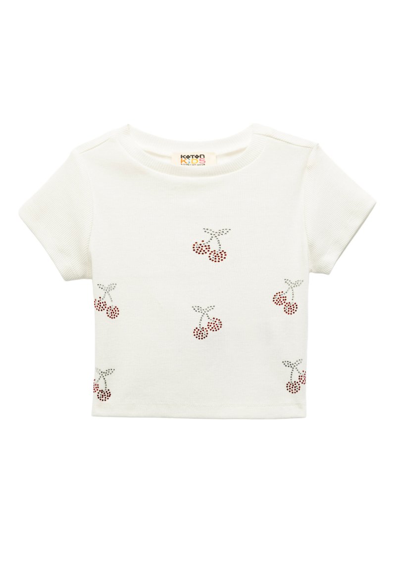Camiseta infantil de manga corta blanca hecha de tela de canalé, adornada con un patrón disperso de cerezas rojas y negras.