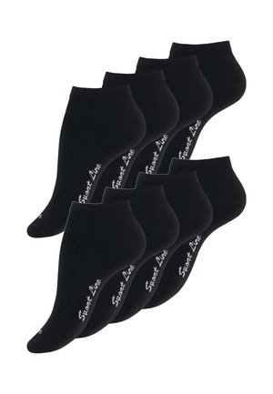 Six paires de chaussettes noires à cheville en tissu flexible, avec une texture lisse et un logo blanc sur le côté.