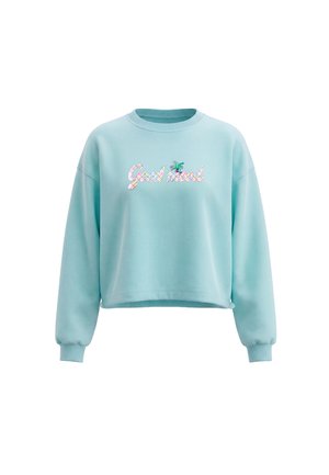 Lyseblå cropped sweatshirt med lange ærmer og "Good Vibes" tekst samt en lille palme grafik på brystet.