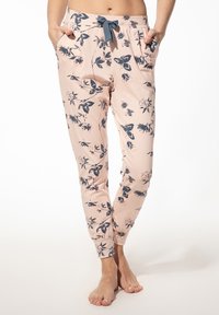 Roze pyjamabroek met een marineblauw bloemenpatroon, elastische tailleband met een strikkoord, zijzakken en aansluitende boorden bij de enkels.