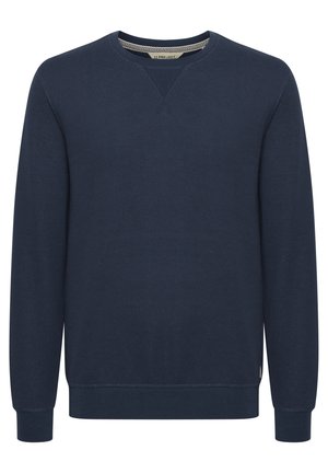 Navy blue sweatshirt with a textured fabric, ribbed cuffs, and neckline. Features a V-shaped design at the collar and minimal accents.