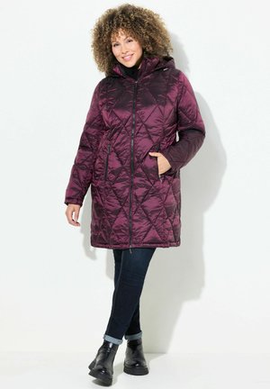 Quilted, long burgundy puffer coat with a hood, featuring zippered pockets, a shiny finish, and a cinched waist for shape.
