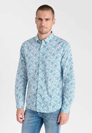 Lange mouw knoopshirt in lichtblauw met kleine bloempatronen. Gemaakt van katoen, met een klassieke kraag en gele knopen.
