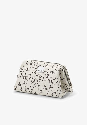 Pouch cosmetico in tela beige con macchie astratte nere, chiusura con zip e etichetta bianca del marchio. Forma strutturata con base piatta.