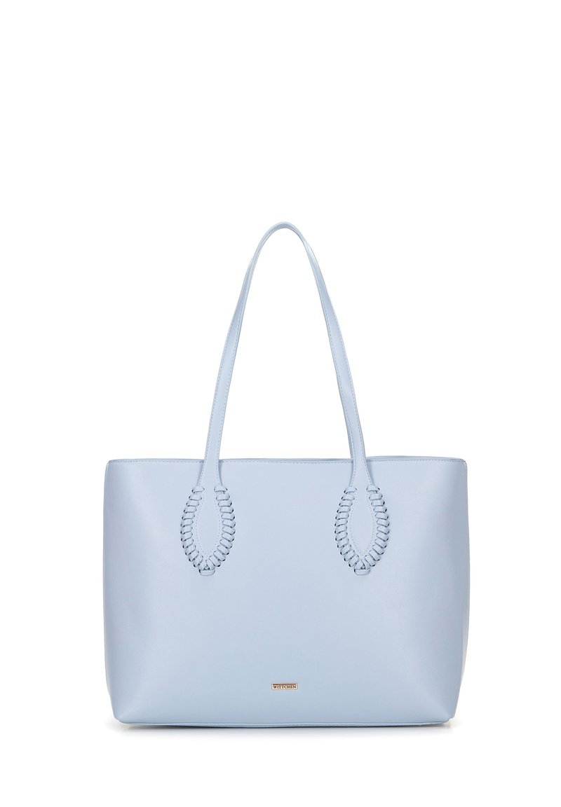Sac fourre-tout bleu clair en matériau lisse, avec deux accents de poignées tressées et un petit logo métallique à l'avant.