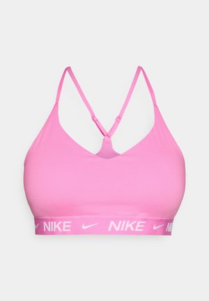 Pink sports bra with a V-neck design, adjustable straps, and elastic band featuring a white Nike logo. Smooth, stretchy fabric.